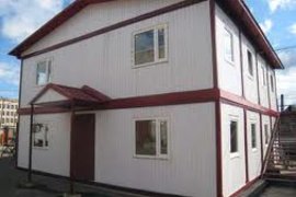 Дома из блок контейнеров фотография